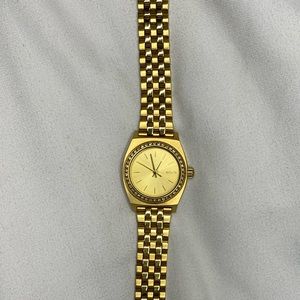 Gold Nixon watch